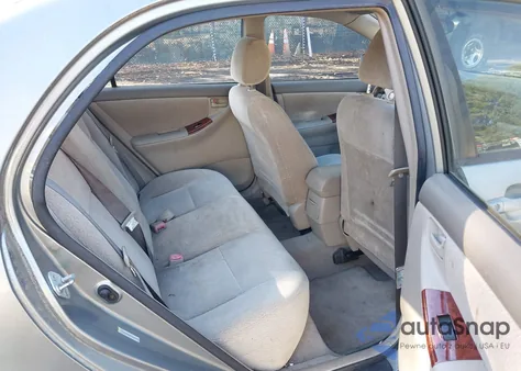 2004 Toyota Corolla Le z USA, uszkodzony, nr VIN JTDBR32E742025979